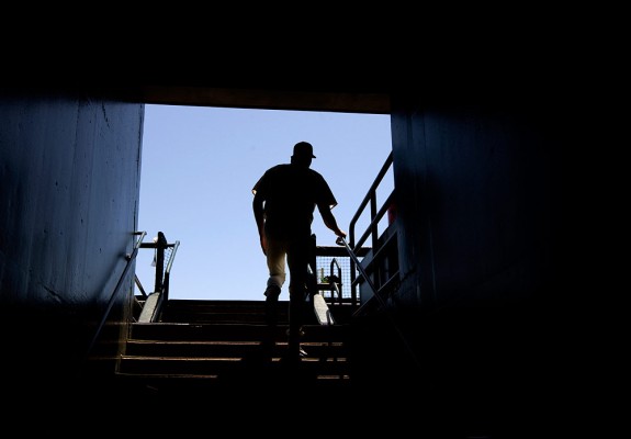 Randy Johnson of the San Francisco Giants walks up the stairs into the dugout before the game against the New York Mets at AT&T Park in San Francisco, California on Saturday, May 16, 2009. (Photo by Brad Mangin)