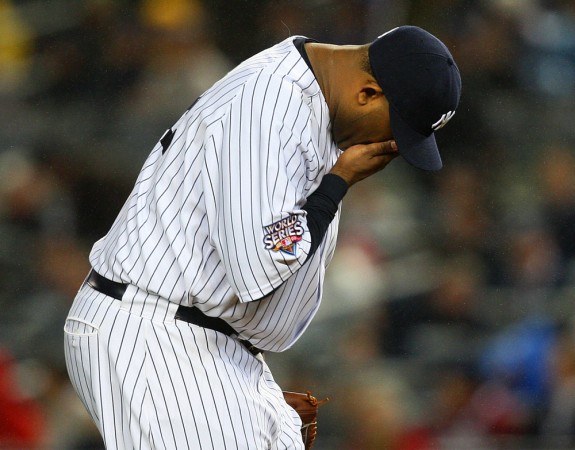 New York Yankees starting pitcher CC Sabathia is not happy on the mound after giving up Chase Utley's second home run of World Series Game 1 in New York. (Photo by Brad Mangin/MLB Photos)