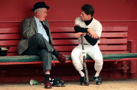 Brett Butler of the San Francisco Giants talks to San Francisco Examiner sports writer Harry Jupiter in the dugout before a game at Candlestick Park in San Francisco, California in 1989. (Photo by Brad Mangin)