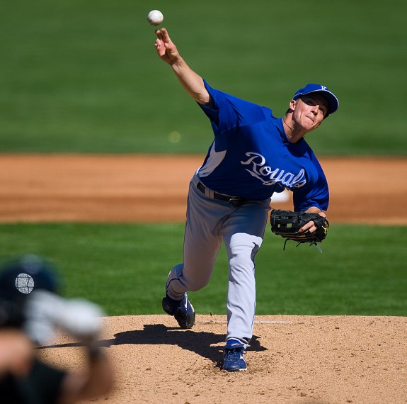 Zack Greinke of the Kansas City Royals pitches during their spring training game against the San Francisco Giants at Scottsdale Stadium in Scottsdale, Arizona on February 27, 2009. (Photo by Brad Mangin)