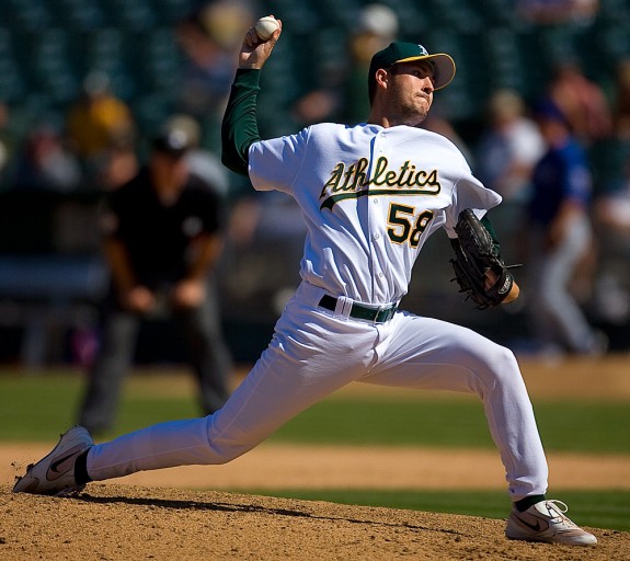 Athletics pitcher Justin Duchscherer pitches against the Texas Rangers vs Oakland Athletics game at McAfee Coliseum in Oakland, CA on September 6, 2006. (Photo by Brad Mangin)