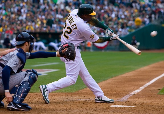 Milton Bradley of the Oakland Athletics bats against the Minnesota Twins in Game 3 of the ALDS at McAfee Coliseum in Oakland, CA on October 6, 2006. (Photo by Brad Mangin)