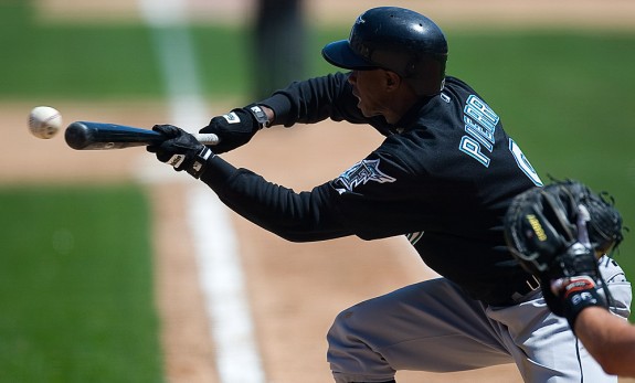 Florida Marlins batter Juan Pierre bunts during a game against the San Francisco Giants at AT&T Park in San Francisco, CA on May 1, 2004. (Photo by Brad Mangin)