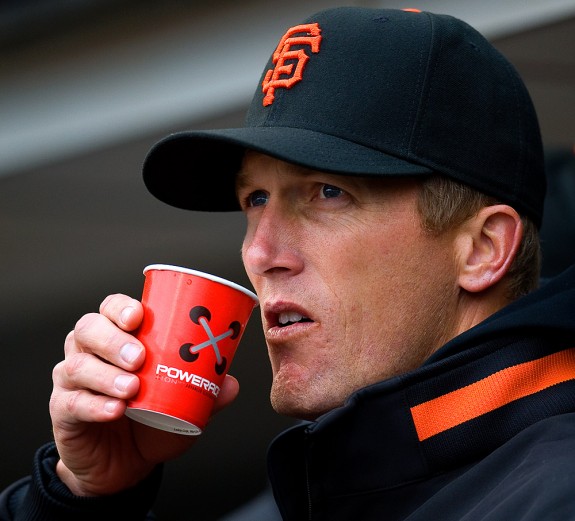 Bob Howry of the San Francisco Giants drinks Powerade in the dugout during the game against the Milwaukee Brewers at AT&T Park on April 9, 2009 in San Francisco, California. (Photo by Brad Mangin)