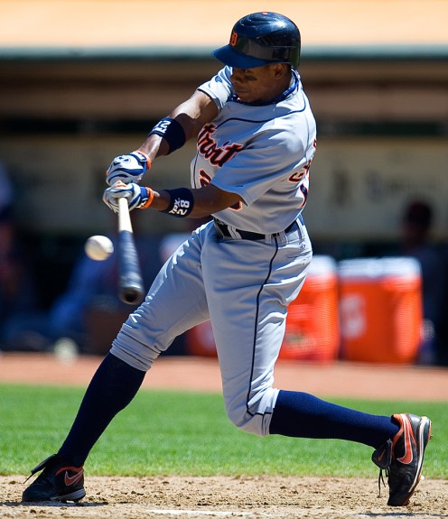 Curtis Granderson #28 of the Detroit Tigers bats against the Oakland Athletics during the game at the Oakland-Alameda County Coliseum on August 23, 2009 in Oakland, California. (Photo by Brad Mangin)