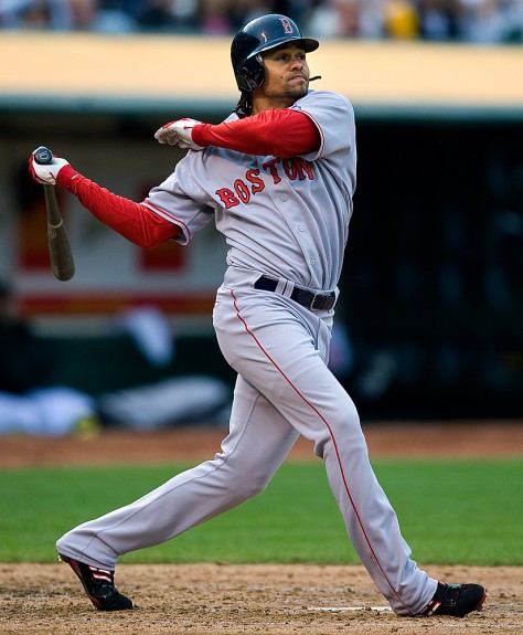 Coco Crisp of the Boston Red Sox bats during the game against the Oakland Athletics at the McAfee Coliseum in Oakland, California on May 24, 2008. (Photo by Brad Mangin)