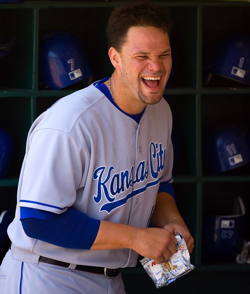 Ryan Shealy of the Kansas City Royals gets ready in the dugout before the game against the Oakland Athletics at the McAfee Coliseum in Oakland, California on May 17, 2007. (Photo by Brad Mangin)