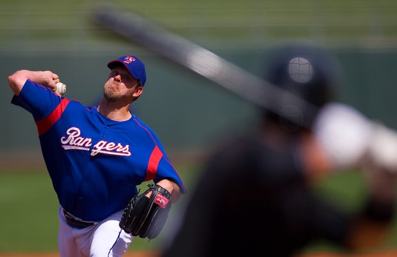 Texas Rangers pitcher Kevin Millwoodpitches against the Chicago White Sox during a spring training game in Surprise, AZ on March 23, 2006. (Photo by Brad Mangin)