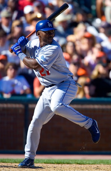 Milton Bradley of the Los Angeles Dodgers bats during a game against the San Francisco Giants at AT&T Park in San Francisco, CA on September 25, 2004. (Photo by Brad Mangin)