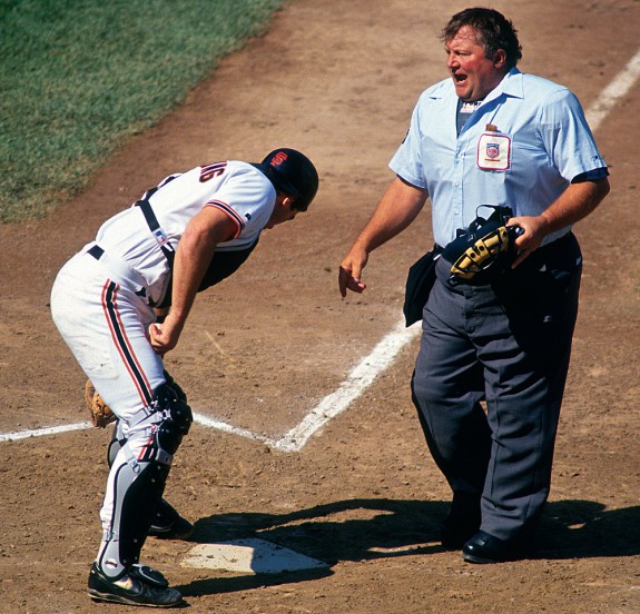 Kirt Manwaring of the San Francisco Giants argues a call at home plate with umpire Bruce Froemming during a game at Candlestick Park in San Francisco, California in 1993. (Photo by Brad Mangin)