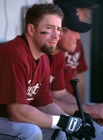 OAKLAND, CA: Jeff Bagwell of the Houston Astros in the dugout during a game against the Oakland Athletics at the Oakland Coliseum in Oakland, California in 2001. (Photo by Brad Mangin)